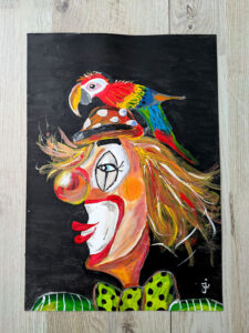 Clown met vogel